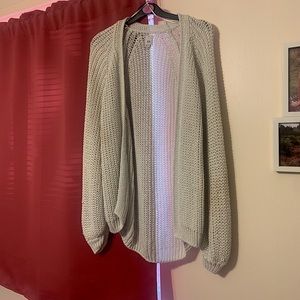 Cream/ Off White Holey Sweater. It is and XS but fits like a S